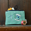 Needle and thread embroidered coin purse