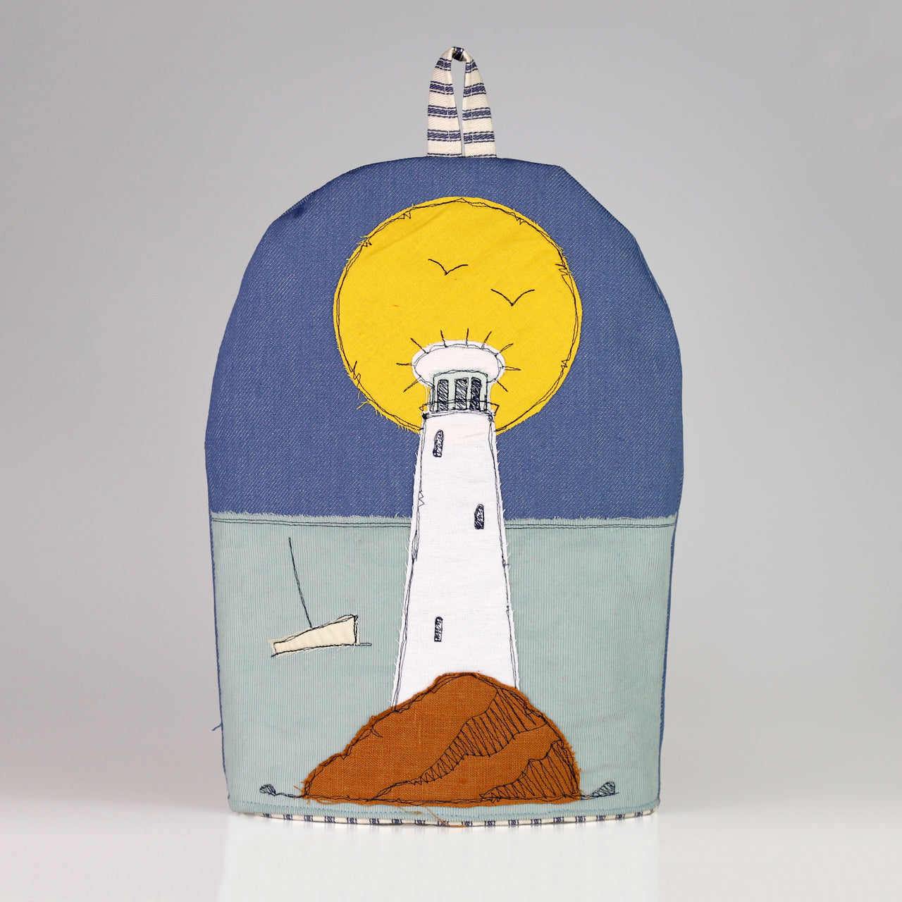 lighthouse coffee cosy