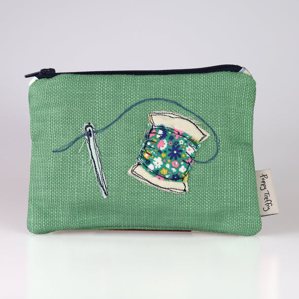 Needle and thread embroidered coin purse