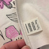 organic label on bee tea towel